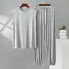 Conjunto de dos piezas para hombre de talla grande: Camiseta sin mangas deportiva casual holgada de cuello redondo de modal y pantalones jogger