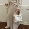 Bolso de mano de alta gama, lujo ligero, nicho para mujer, nuevo bolso tote acolchado de verano para el trabajo, al hombro y cruzado