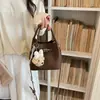 Set de Bolsos Minimalistas Transfronterizos para Mujer 2026 Nuevo Bolso Cubo para el Trabajo Bolso de Hombro Cruzado Texturizado de Verano