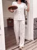 Popular conjunto transfronterizo europeo y americano de ropa para el hogar, talla grande con estampado de cerezas, cuello redondo, manga corta y pantalones largos, adecuado para usar como ropa exterior o como conjunto de pijama tipo suéter.