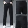 Nuevos jeans negros de alta gama para hombre, corte recto ajustado, pantalones casuales elásticos versátiles para primavera y otoño