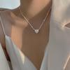 Collar chapado en plata s925 para mujer, diseño de nicho de clavícula, colgante de amor de lava de papel de caramelo, joyería sencilla de verano