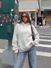 Sudadera con capucha y bolsillo de color liso, estilo nuevo de otoño e invierno, holgada y cómoda, para mujer, transfronteriza de Amazon para Europa y América, 2026