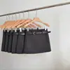 Saia Elegante de Lã Preta Versátil 2025 para Mulheres no Outono e Inverno Sexy de Cintura Alta Justa Versátil em Linha A