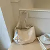 Bolsa transversal de design nicho de alta qualidade com alça larga para mulheres 2026 nova tendência moderna estilosa para o dia a dia bolsa de ombro único