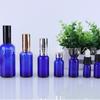 Botella de aceite esencial de vidrio azul en stock, botella de emulsión de 30 ml, botella pequeña de aceite esencial, botella de perfume de 5 ml, botella de aceite esencial azul.