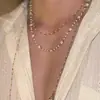 Collar multicapa de estilo palaciego retro europeo y americano con un ambiente vintage, cadena para la clavícula de nicho de moda, dulce y genial