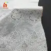 Vestido de verão novo grande bordado à máquina camisa frente única tecido bordado ponto de algodão perfurado bordado tecido bordado