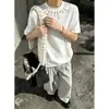 Camiseta Masculina de Verão Preta Estilo Americano com Tachas, Manga Curta e Ombreiras, Apresentando um Design Cool e de Alta Qualidade