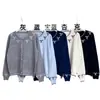 Cárdigan cálido de estilo coreano casual, suave y acogedor, con bloques de color y lazo, para mujer, nueva prenda exterior de otoño ajustada en color gris