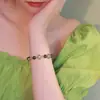 Pulsera de Trébol de Cuatro Hojas Nueva 2022 para Mujer Suerte Diseño de Nicho Sentido de Diseño Celebridad de Internet Blanco Imitación Calcedonia Verde Simple Transporte