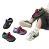 Zapatillas infantiles con puntera de concha 2026 nuevos modelos primavera y otoño zapatos de niña zapatillas de entrenamiento alemanas zapatillas deportivas transpirables para niño estrella