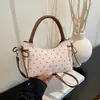 Elegante bolso de mano de lunares estilo coreano, un modelo nuevo 2026 lindo y moderno, perfecto para niñas jóvenes - un bolso cilíndrico redondo que se puede llevar en la mano, usar como bolso de hombro o colgar cruzado