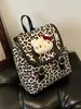 Mochila unisex de moda transfronteriza con estampado de leopardo y diseño de gatito de dibujos animados, mochila escolar para estudiantes, nuevo modelo 2026 mochila de viaje para niños