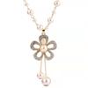 Cadena de suéter larga cruzada espejo para mujer, collar largo de tulipán, accesorios colgantes para ropa de temperamento, fabricantes venden