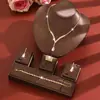 Conjunto de Colar com Pedras Strass para Festa Moda Brincos Pingente Gota D'água Soldados com Garra Diamante Conjunto de Joias Simples de Luxo Leve Europeu e Americano
