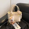 Bolsas de Mujer de Nicho Transfronterizas Otoño e Invierno 2026 Nueva Moda Bolso Cruzado Versátil Bolso de Mano de Alta Gama Bolso de Hombro Tipo Cubo