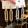 Europeu e Americano oco longo borla brincos moda vento frio design personalidade eardrop nicho brincos Coringa atacado