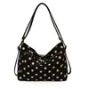 Bolso de mano de moda retro de lunares para mujer, nuevo bolso versátil de gran capacidad para el otoño e invierno de 2026, para ir al trabajo, de hombro y cruzado
