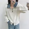 Cardigan de Tricô Patchwork Jeans Longo com Gola Lapela Estilo Coreano Solto Casual Novo Outono/Inverno 2026 para Mulheres, Elegante e Emagrecedor Tendência