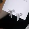 Brincos de laço em prata de lei 925, brincos de luxo leve, design de nicho, sensação de alta qualidade, brincos de verão requintados para mulheres