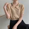 Suéter de Tricô Vazado com Gola Peter Pan Estilo Xiao Xiang Fino para Mulheres Verão Novo Moda Doce Senso de Design Top de Manga Curta