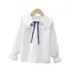 Camisa de menina Primavera e Outono nova camisa de algodão de manga comprida com gola de boneca para crianças médias e grandes camisa casual de moda para meninas