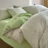 Nueva Colección Primavera/Verano 2026: Juego de Cama de Cuatro Piezas Jacquard Teñido en Hilo Grado A 100% Algodón Transpirable y Suave con la Piel Gasa de Doble Capa Algodón Lavado