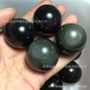 Bola de cristal de obsidiana de ojo de arcoíris natural, conjunto de siete estrellas, accesorios de decoración, bola de Yaoshi negra Wujin, cristal al por mayor