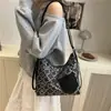 Bolsa de tela de moda transfronteriza para mujer 2025 Primavera y Verano Nuevo Nicho Bolso Tote Portátil Bolso de Hombro Único de Alto Grado