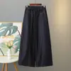 Calça jeans larga feminina especial plus size outono nova simples afunilada com costura aparente e cintura elástica 0946