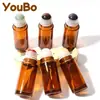 Botella dispensadora de aceite de ricino de vidrio ámbar de 50 ml, botella aplicadora roller de jade cristal rosa natural, botella aplicadora roller de cuarzo rosa