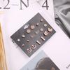Pendientes de primavera para mujer, de aleación galvanizada, con diseño de trébol de amor, sencillos y avanzados, de fabricante europeo y americano.