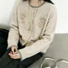 Cárdigan de punto de ganchillo tridimensional suave estilo francés para mujer, nuevo suéter top de manga larga con cuello redondo suave para otoño 2026