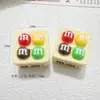 Accesorios de resina de frijoles de chocolate de caramelo de dibujos animados 3D, accesorios para el cabello DIY con pegamento de crema, colgantes para teléfono, hebillas de zapatos, venta al por mayor de accesorios pequeños