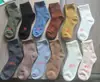Calcetines gruesos estilo japonés de caña alta para mujer, calcetines gruesos de invierno forrados de felpa tipo toalla para dormir, calcetines cálidos de media pantorrilla para el hogar