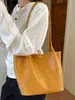 Bolso Tote de Gran Capacidad con Textura Tejida para Mujer 2026 Verano Nuevo Moda Casual Color Sólido para el Trabajo Bolso de Hombro Único