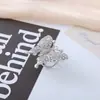 Pin de Clip para Bufanda de Camelia de Perlas Artificiales con Lazo Transfronterizo para Mujer, Clip de Esquina de Ropa de Alta Gama, Exquisito Accesorio de Broche de Nicho