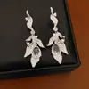 Pendientes de Botón Vintage Usados de Circonita Cúbica Forma de Gota de Agua Hoja Pendientes Exquisitos de Nicho Joyería para Orejas de Lujo Ligero Gama Alta Venta al por Mayor