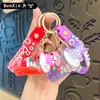 Jalea de Arena Líquida Infundida con Aceite Frijol de Gelatina Sanrio Taza de Té con Leche Llavero Colgante de Bolsa Acrílico Decoración de Llavero Pequeño Regalo