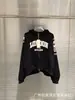 Sudadera con capucha y diseño de dos piezas falsas de patchwork G/R de la marca americana de moda, chaqueta casual holgada para hombre y mujer, ropa de invierno transfronteriza