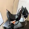 Bolso de diseño nicho estilo coreano, gran capacidad, nueva moda trendy 2026, sensación vintage de alta gama, bolso de hombro cruzado tipo dumpling