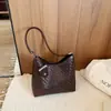 Bolso tejidode moda de gran capacidad para mujer, nuevo modelo primavera 2026, bolso de hombro cruzado simple para el día a día, bolso de axila