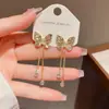 Pendientes Largos Retro Franceses de Metal con Mariposa, Circonita, Gota de Agua y Borla, Personalizados, de Lujo Ligero, Versátiles, Que Te Hacen Ver Más Delgado, Venta al por Mayor