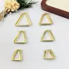 Venta Caliente Cruzada Diseño de Moda Rombo Simple Popular Pendientes de Acero Inoxidable Dorados Tachuelas Estilo Europeo y Americano Joyería para Orejas Venta al por Mayor