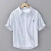 Camisa informal de algodón a rayas de verano para hombre, holgada, elegante, artística, juvenil, de manga corta, moderna para hombre