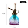 Al por mayor Nuevo Riego Retro Estampado Girasol Vitral Pequeña Regadera Presión Jardinería Tetera de Riego para Uso en Casa