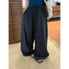 Novo Produto Outono/Inverno 2026: Calça feminina casual estilo coreano retrô, xadrez pequeno, solta, com cordão, perna larga, que cobre o quadril, modeladora e com bom caimento.