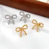 Conjunto de Collar y Aretes de Lazo de Lujo Ligero, Cadena para Clavícula de Acero de Titanio, Joyería de Nicho de Gama Alta, No se Desvanece, Estilo de Moda para Mujer