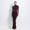 Ropa transfronteriza europea y americana para mujer 2026 otoño nuevo mono de color liso con cuello alto y falda plisada con abertura traje casual para mujer